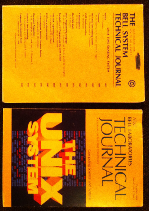 Photo of front and back cover of an orange book with The Unix System written in the center; Above it a text states AT&amp;T Bell Laboratories Technical Jurnal